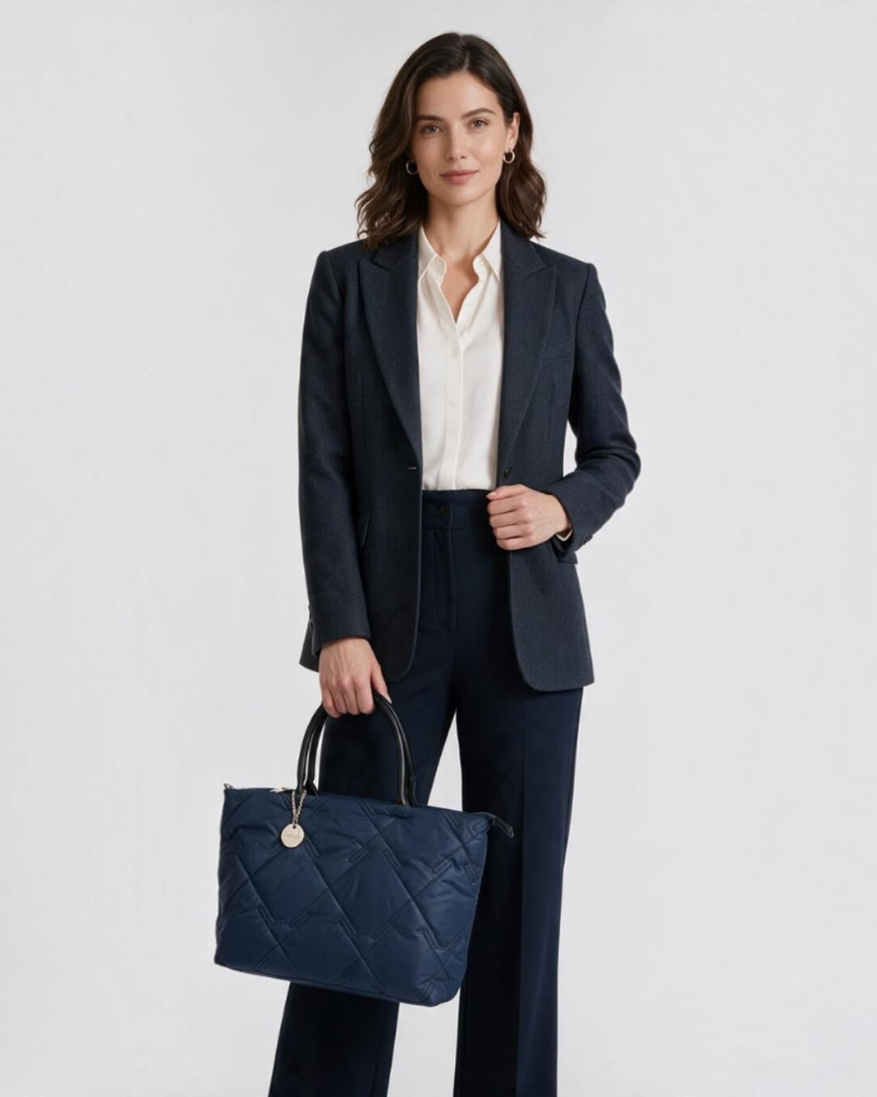 PADDED, STITCHED PATTERN HANDBAG